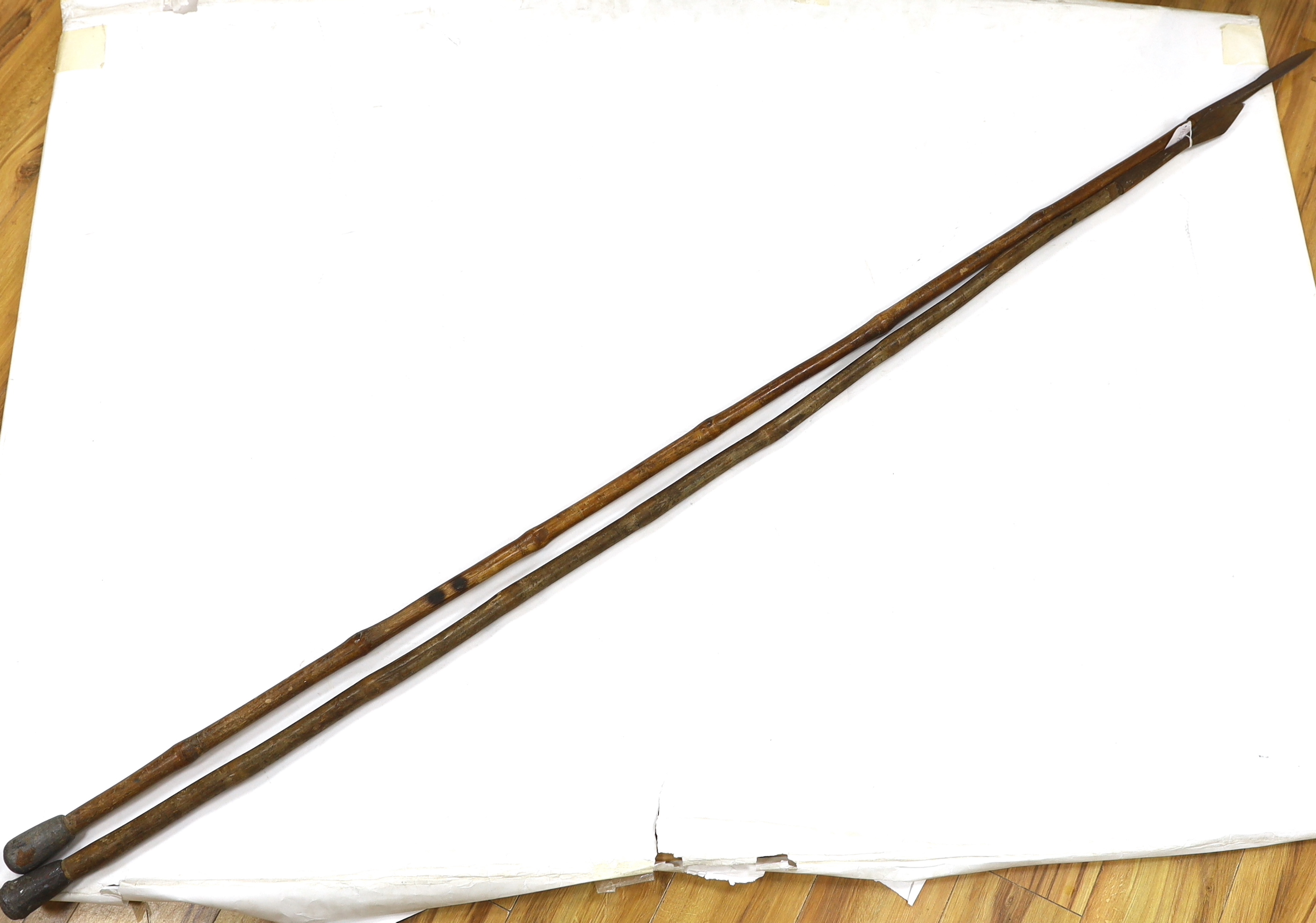 Two late 19th/early 20th century Indian Pig Sticking lances, longer 215cm